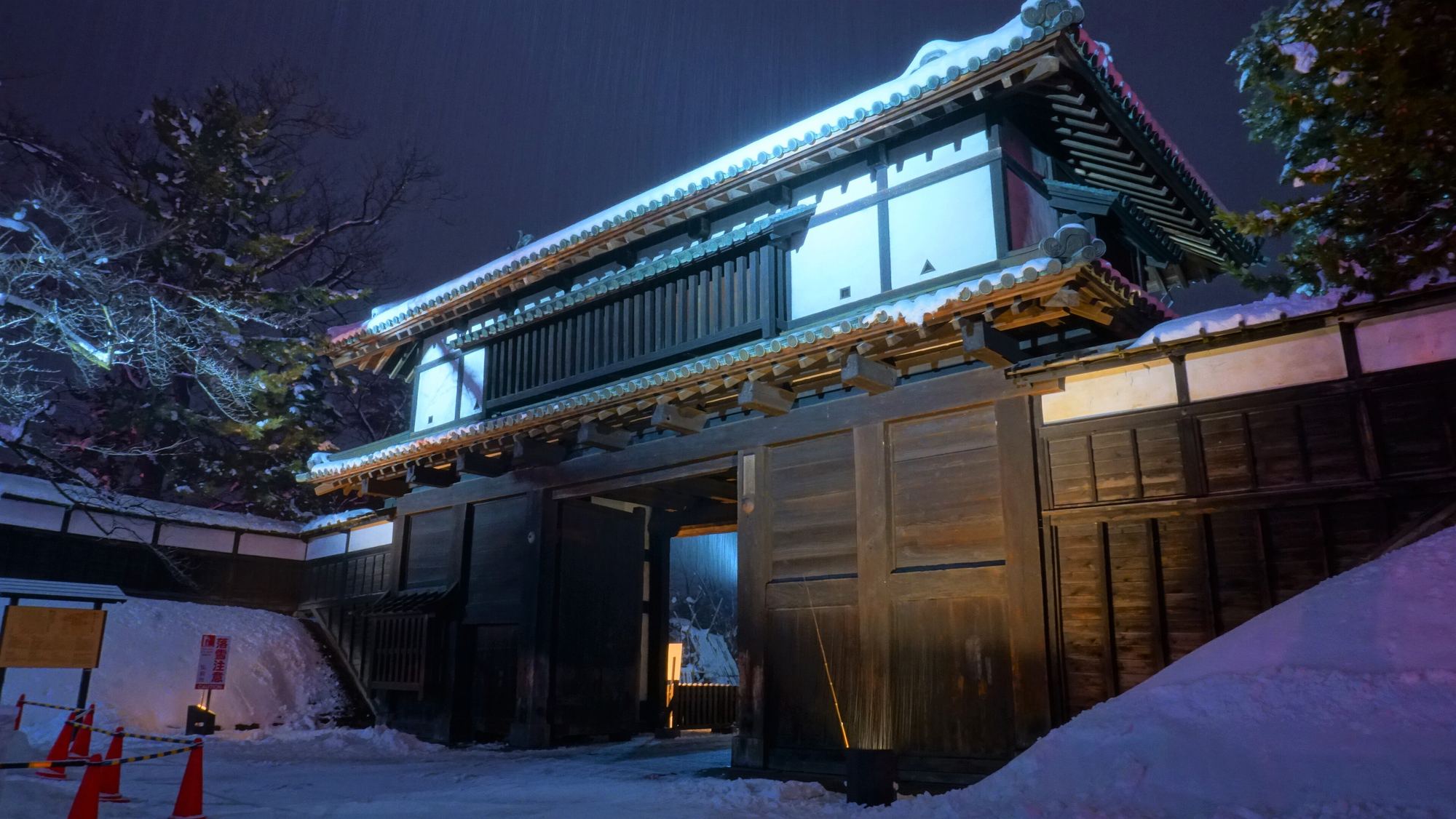 A castle gate at night under snow, Hirosaki Castle
